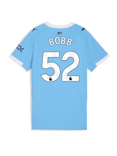Futbalový dresy Manchester City 2025/26 Domáci Oscar Bobb #52 – Dámsky Krátky Rukáv 1 Futbalový dresy Manchester City 2025/26 Domáci Oscar Bobb #52 – Dámsky Krátky Rukáv